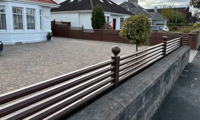 Brown contemporary railings on a driveway